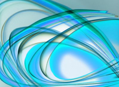 Abstract image of flowing lines of light in cool tones.